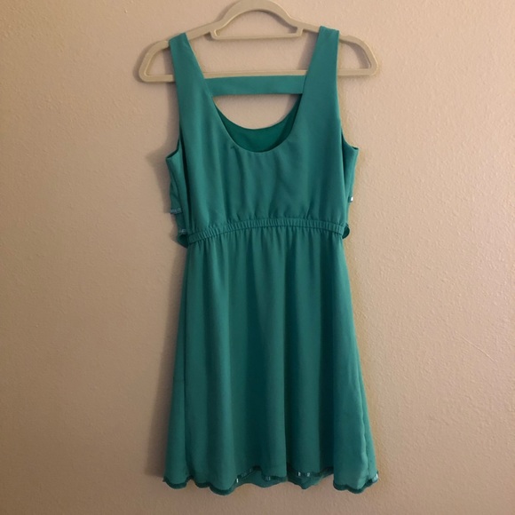 Green dress with beaded sequence trim - Picture 3 of 3